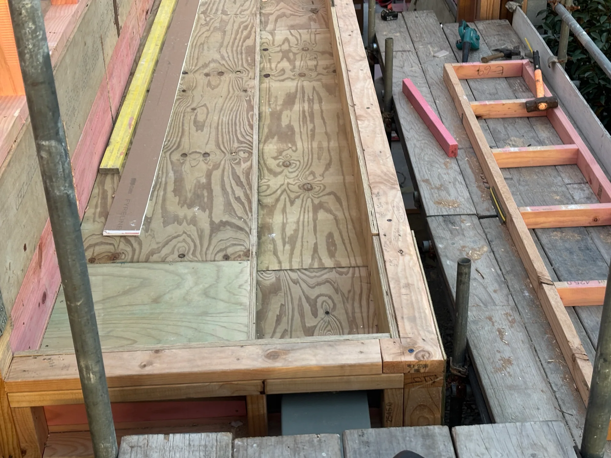 Plywood floor sarking laid over framing on a Christchurch site